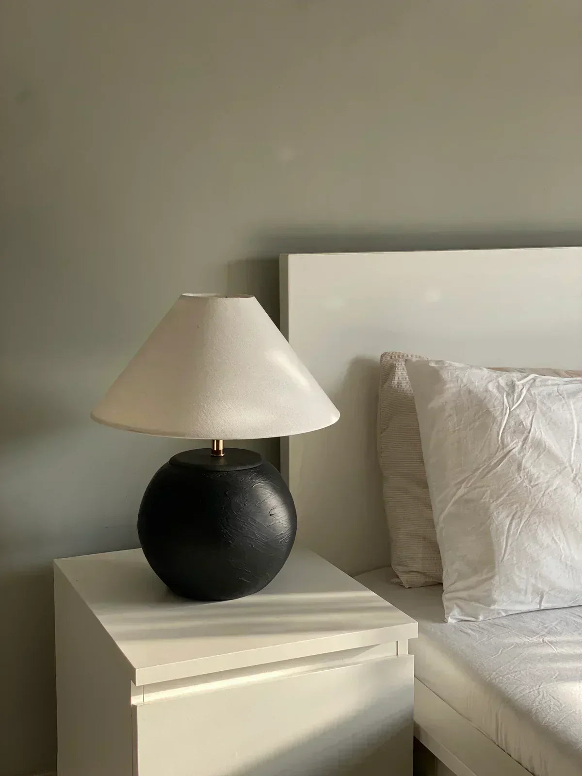 “Orb’ lamp with matte-finished terracotta base and gold accents, paired with a soft cream shade – 17.2-inch artisan lighting for modern spaces.”