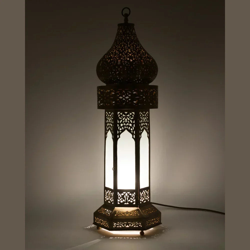 Decorative lantern with intricate patterns on a dark background
