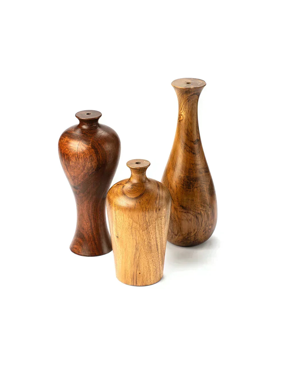 Three wooden vases of different shapes and sizes on a white background