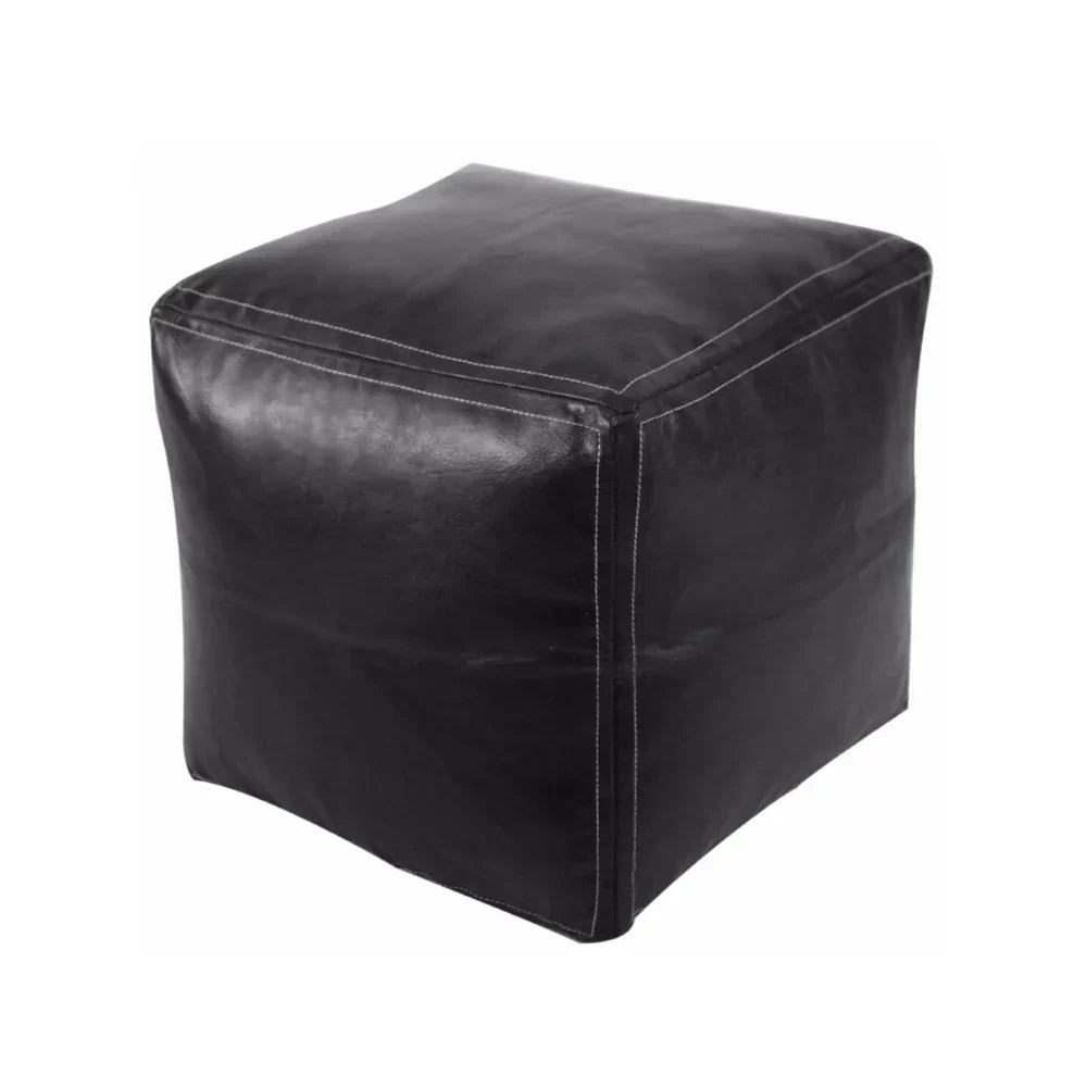 Black cube-shaped ottoman on a white background