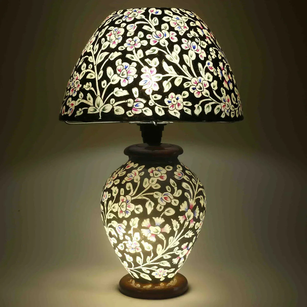 “Unique handpainted camel skin lamp with intricate artisan patterns and warm glow on pine wood base – traditional handmade decor”