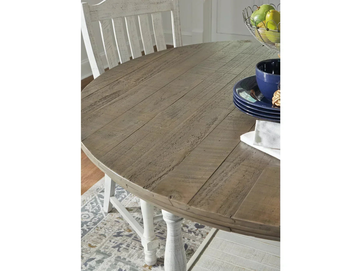 Wooden dining table with chairs in a room setting