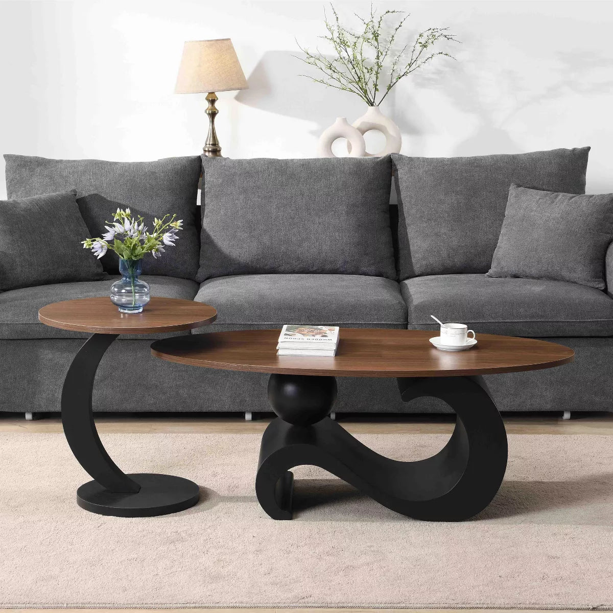 Round wooden table with black curved base and dimensions indicated