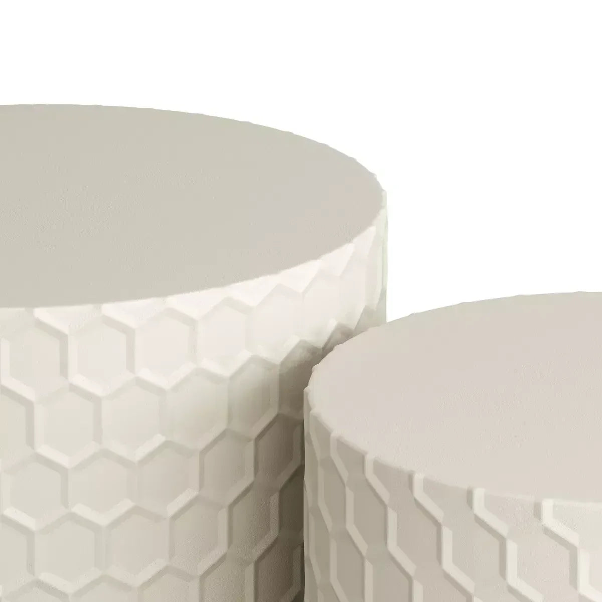 Two white ceramic planters with geometric pattern on a white background White