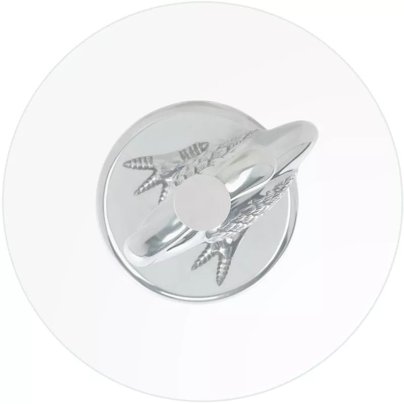 Silver ring with feather design on a white background