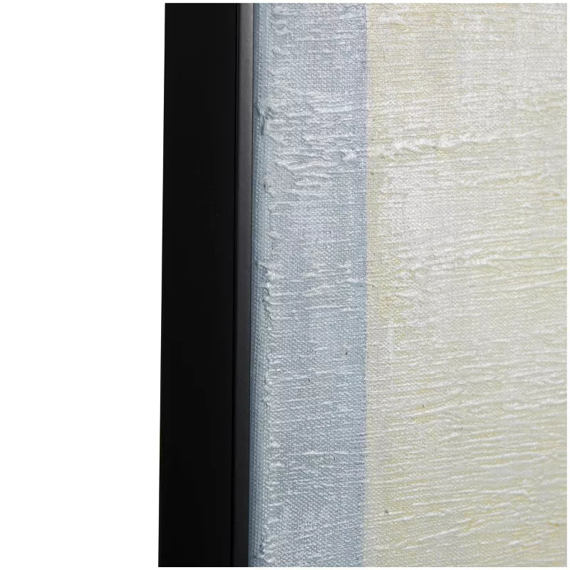 Close-up of a textured book cover with black, gray, and beige colors.