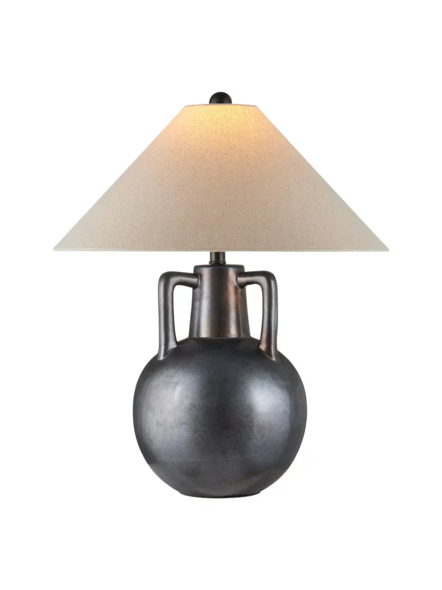Jug-shaped gray ceramic table lamp with reactive glaze finish, bronze accents, and a classic empire shade.