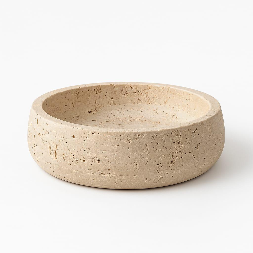 Beige ceramic bowl on a white background