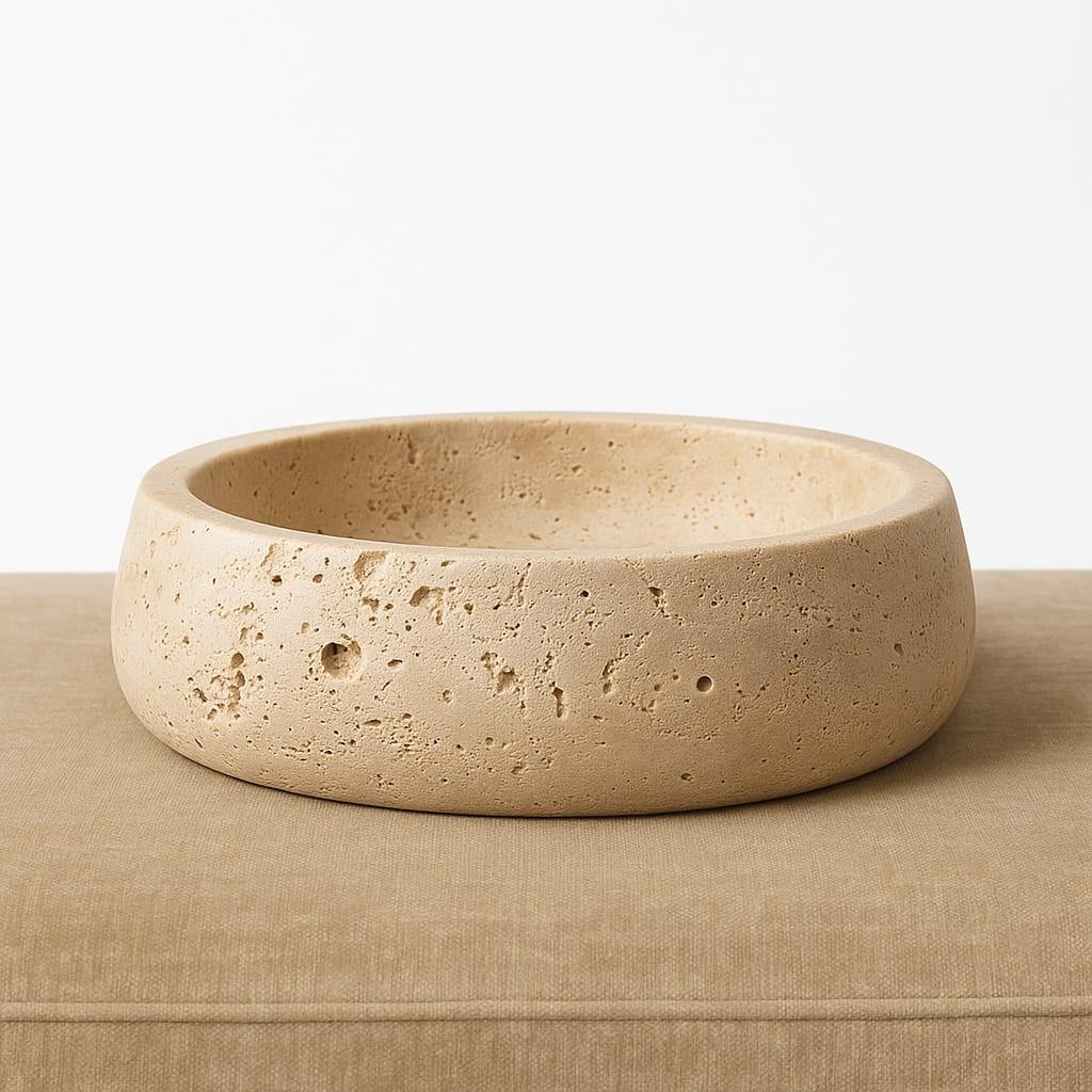 Beige ceramic bowl on a white background