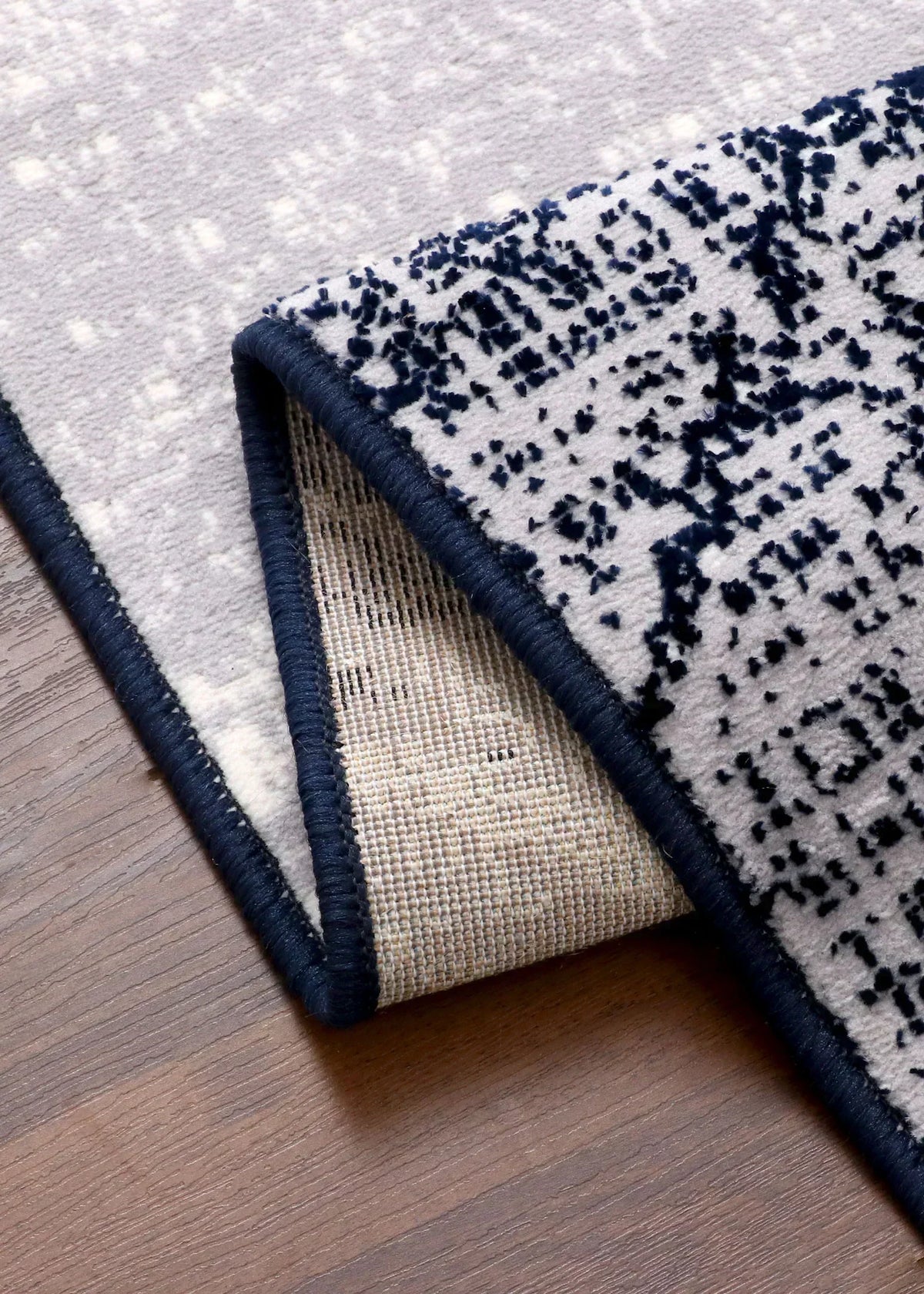 Turkish modern abstract area rug with artistic design and jute backing