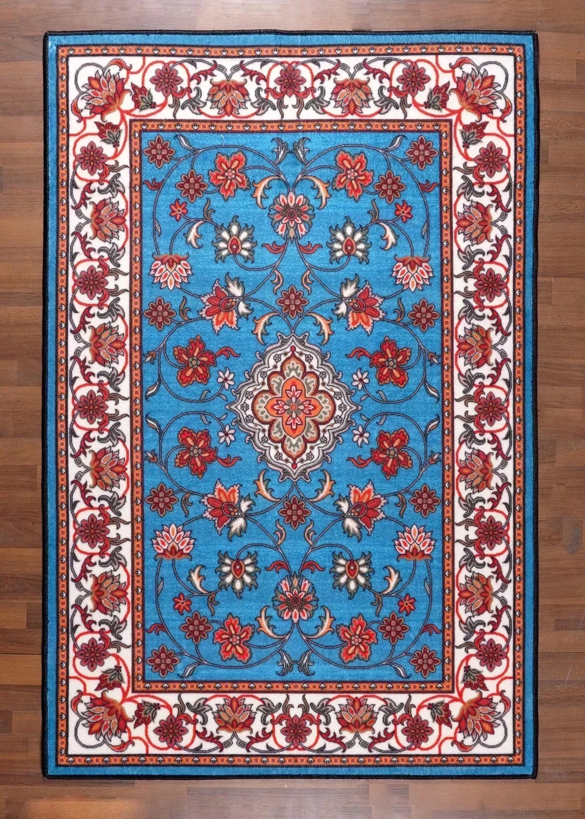 Decorative rug with floral patterns on a wooden floor