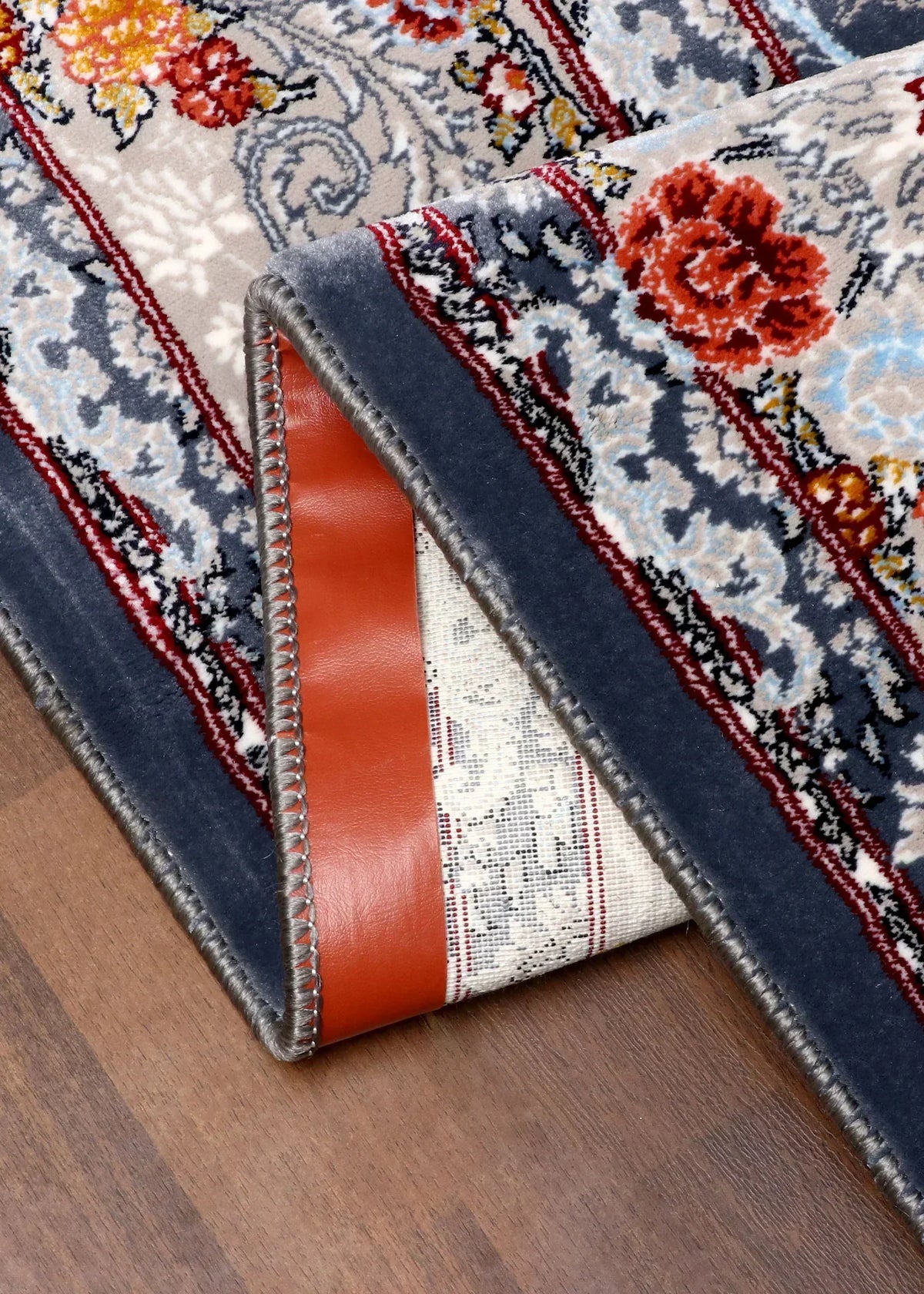 Persian vintage floral rug with antique-style design and soft synthetic pile