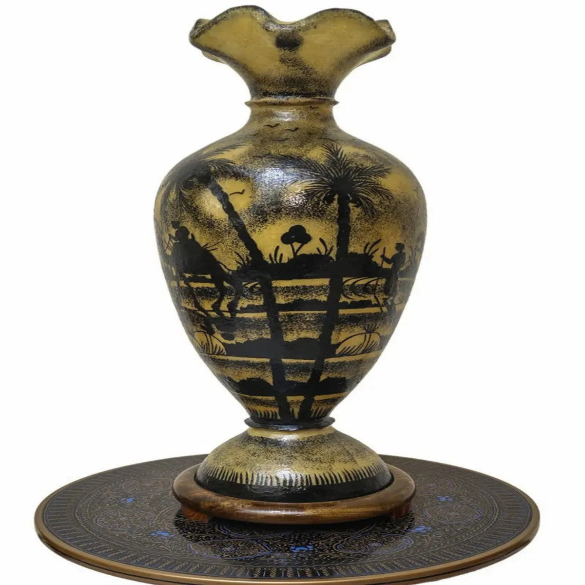 Decorative vase with black silhouette design on a white background