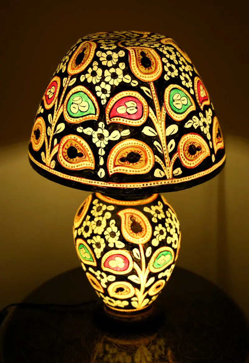 “Handcrafted fluorescent camel skin lamp with colorful patterns and pine wood base – ambient glow decor”
