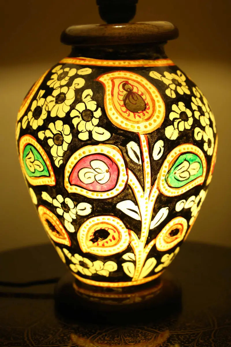 “Handcrafted fluorescent camel skin lamp with colorful patterns and pine wood base – ambient glow decor”