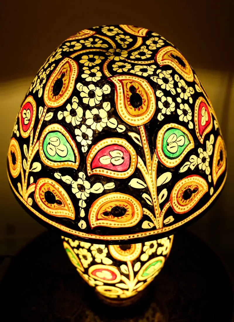 “Handcrafted fluorescent camel skin lamp with colorful patterns and pine wood base – ambient glow decor”