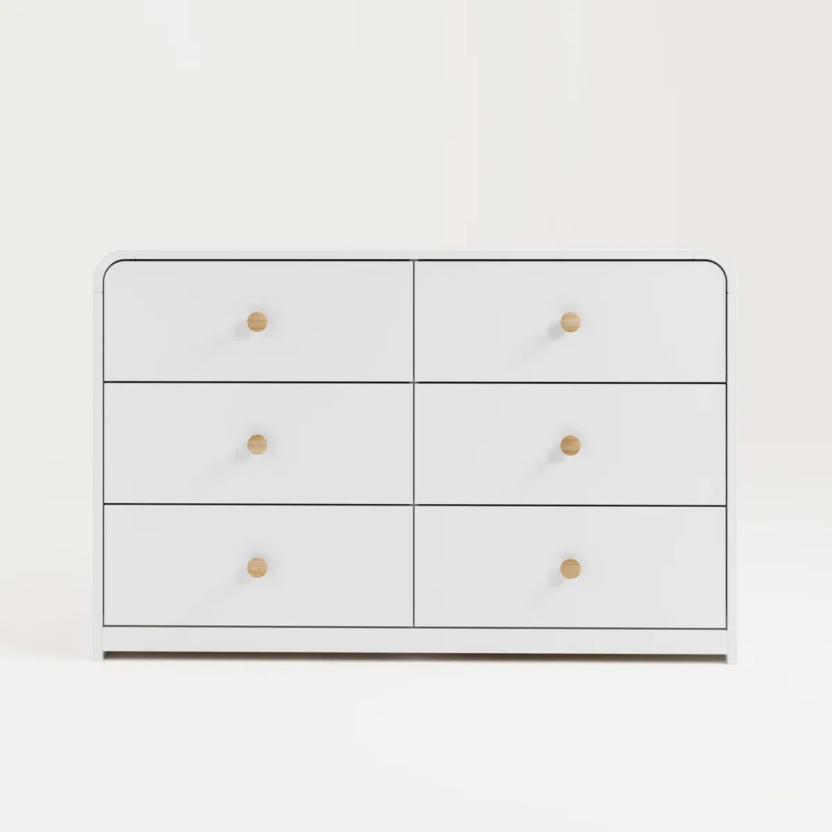 A modern 6-drawer dresser in white with small round gold knobs, shown against a clean white background.