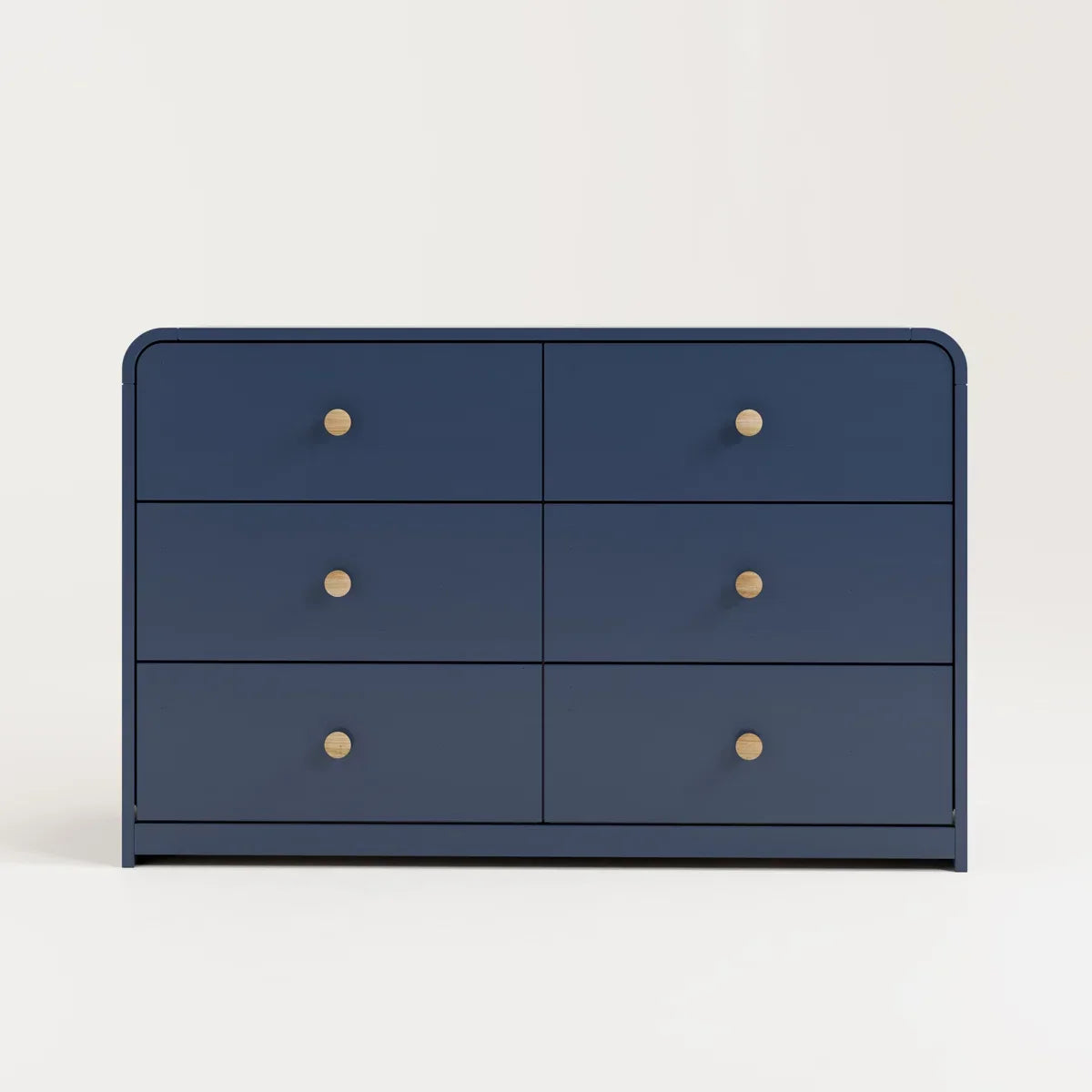 A navy blue 6-drawer dresser with light wood knobs, featuring one open drawer showing a light wood interior, set against a plain off-white background Midnight Blue