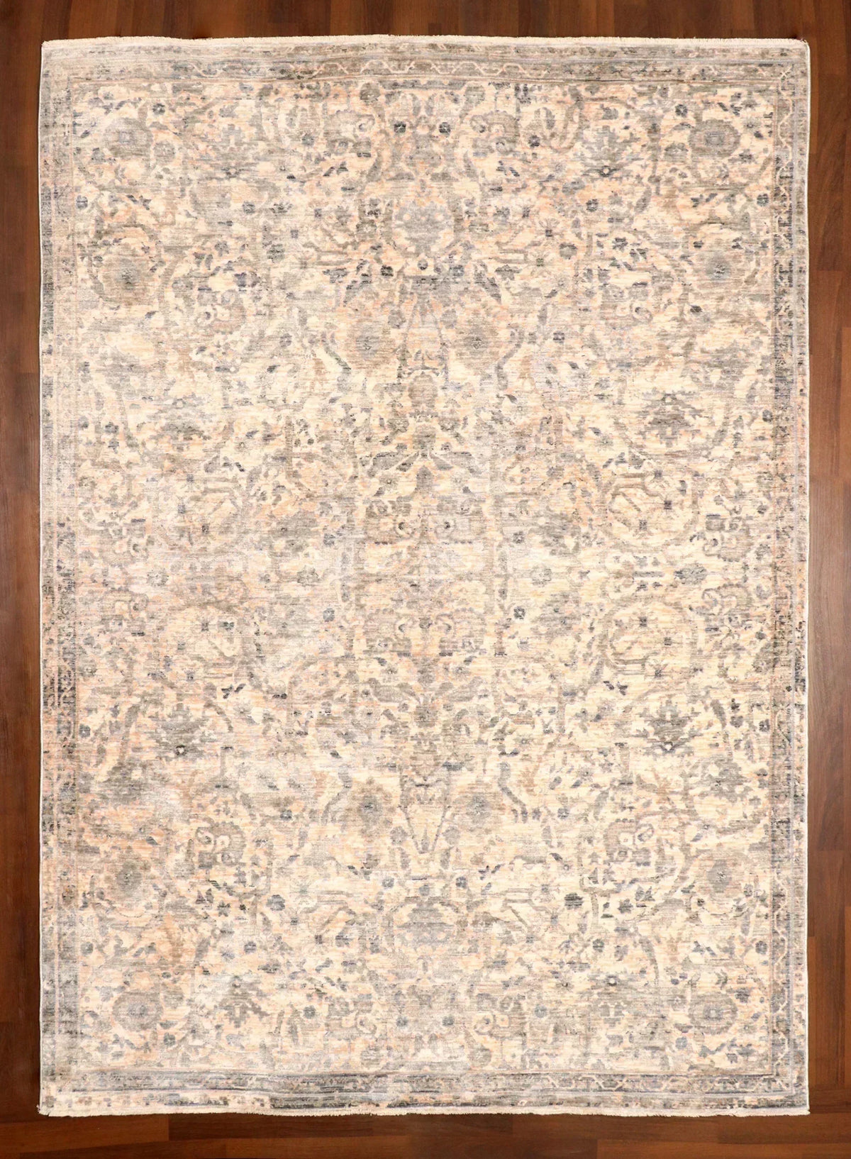 Patterned rug on a wooden floor