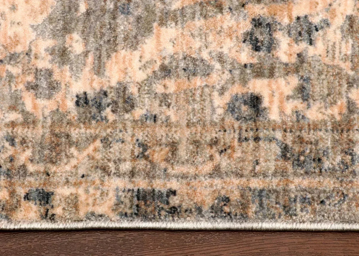 Patterned rug on a wooden floor