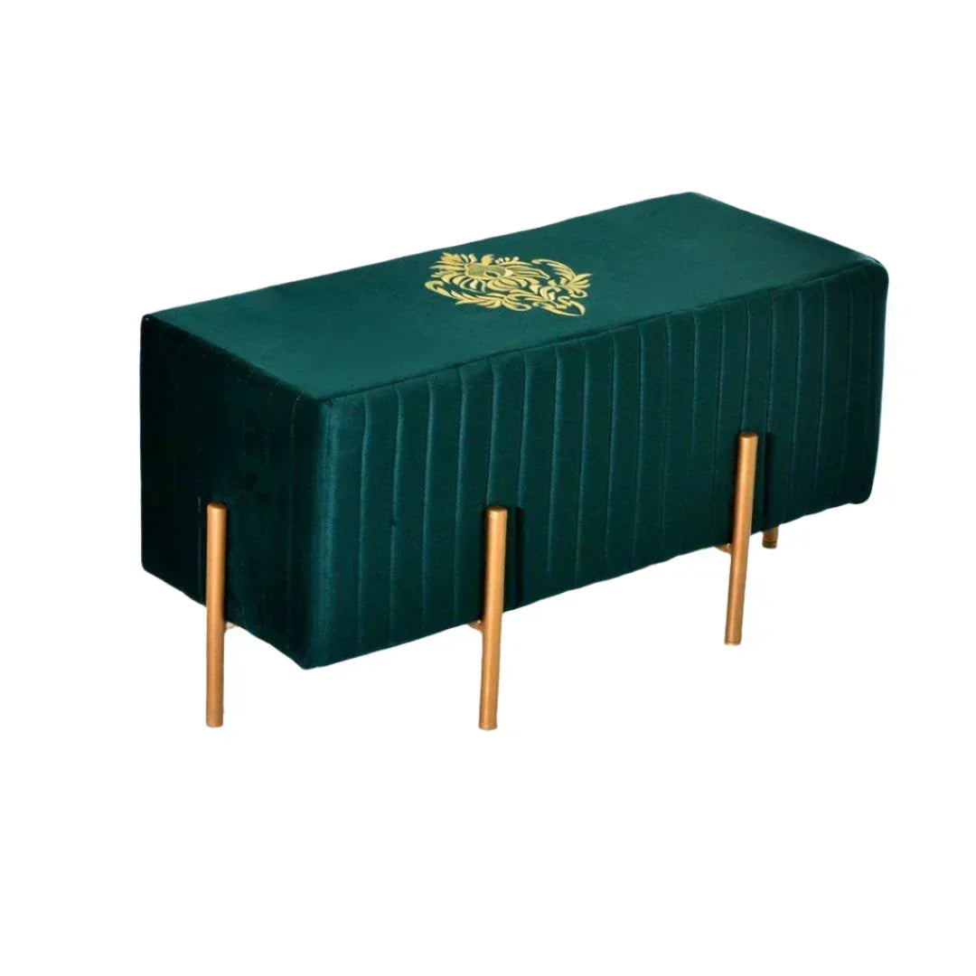 Green table cover with gold emblem on a marble floor