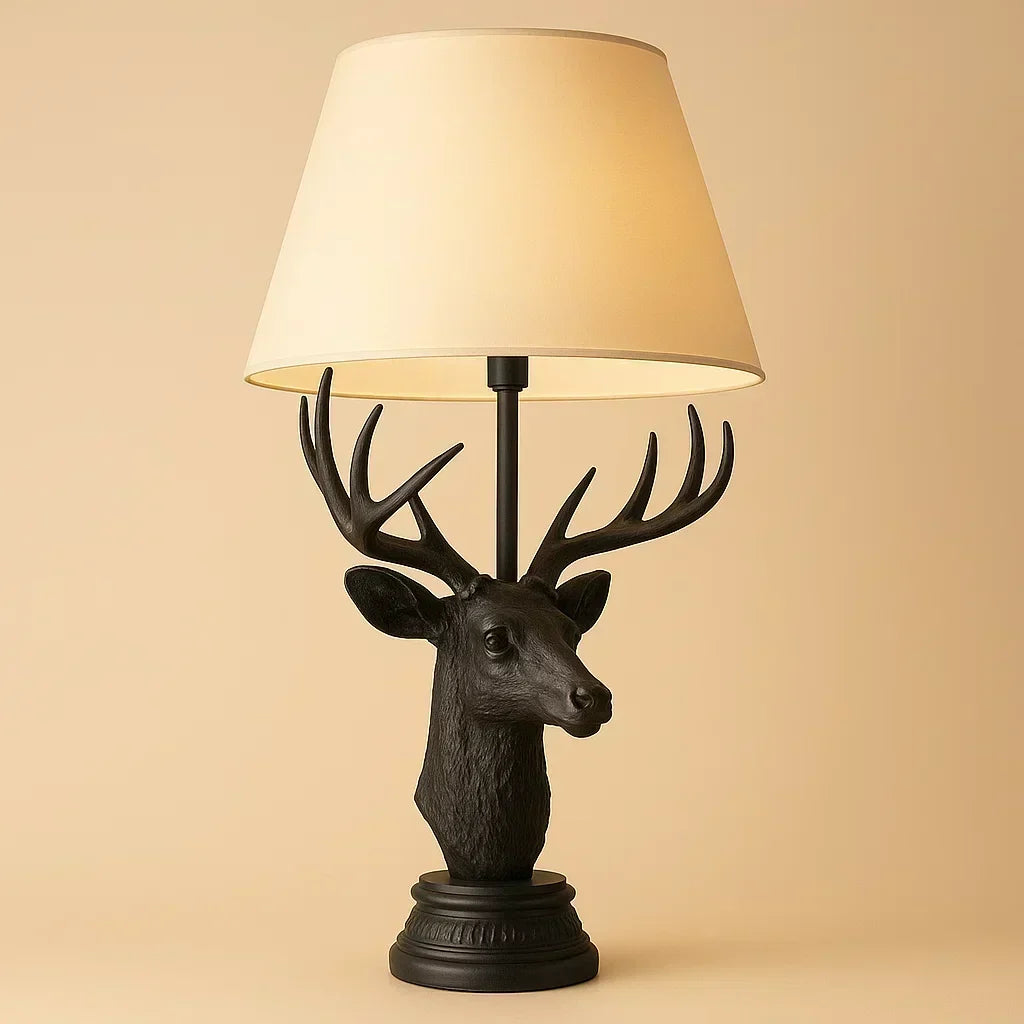 Decorative table lamp with deer head design on a beige background Black