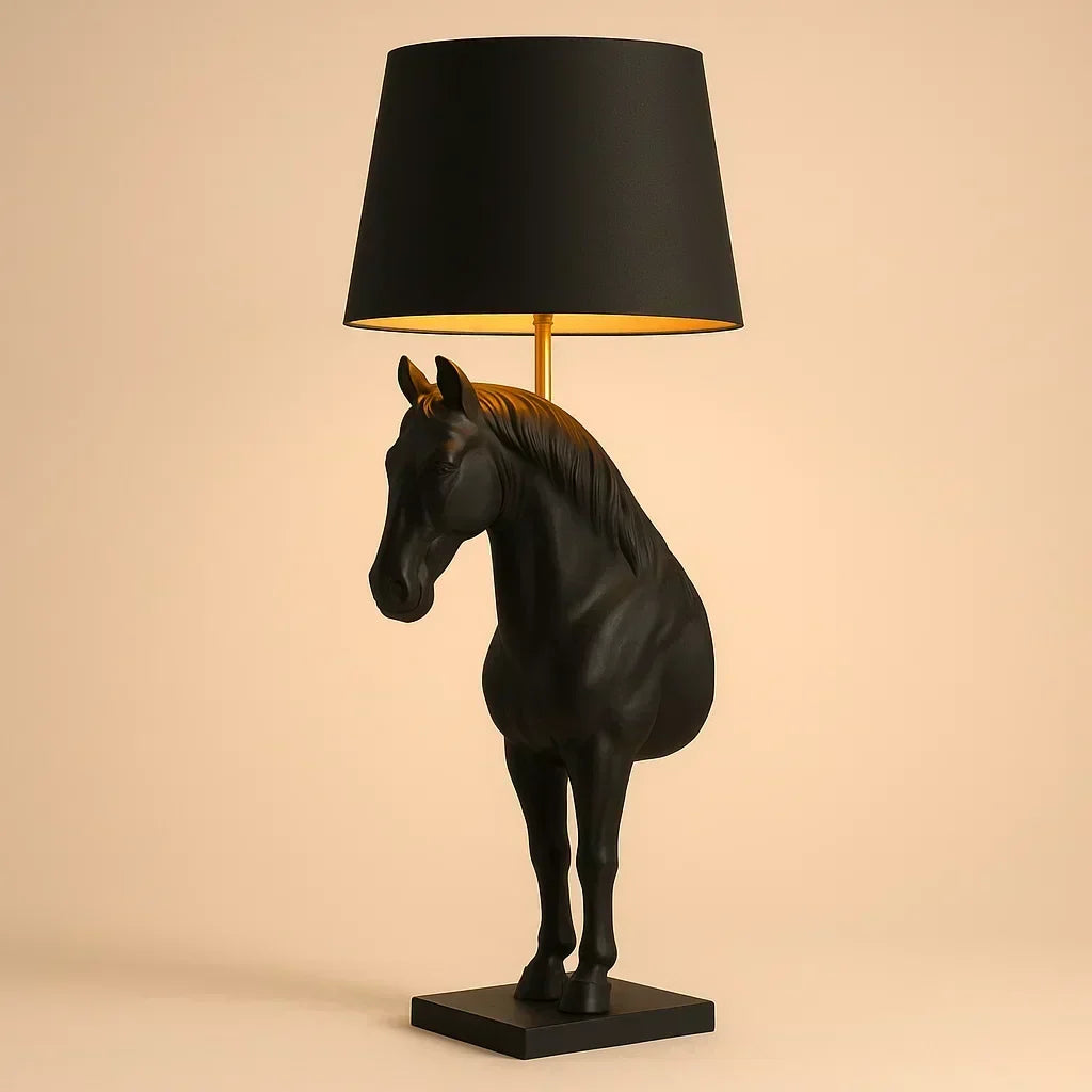 Black horse-shaped table lamp with a black shade on a beige background