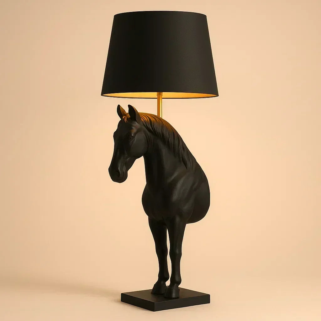 Black horse-shaped table lamp with a black shade on a beige background