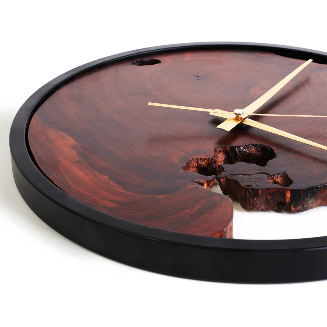Wooden wall clock with a natural grain pattern on a white background