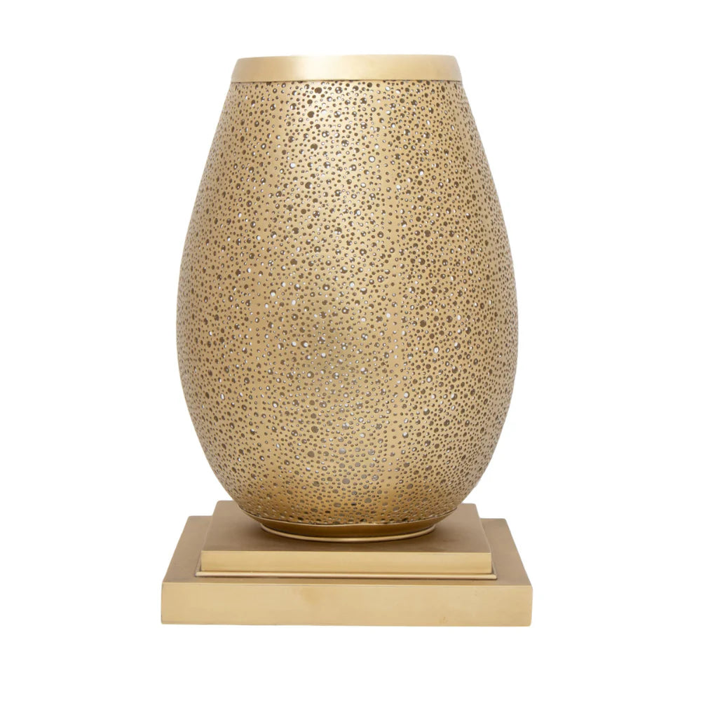 Decorative vase with textured surface and gold base on a white background