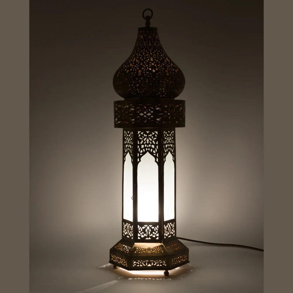 Decorative lantern with intricate patterns on a dark background
