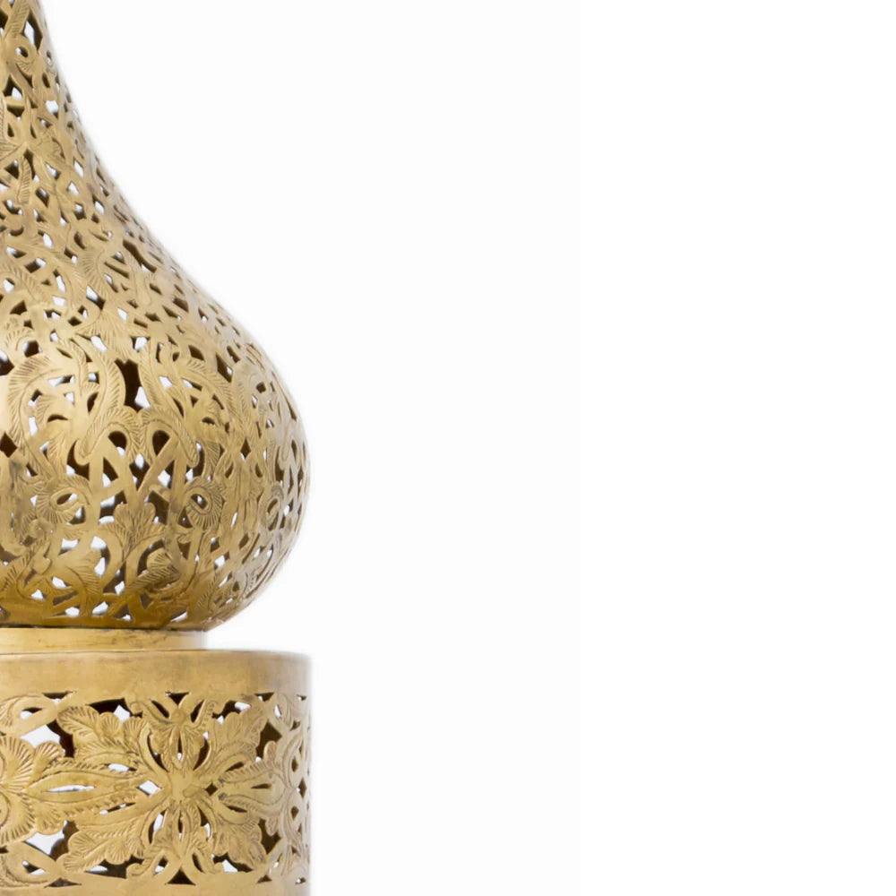 Decorative gold lantern with intricate patterns on a white background