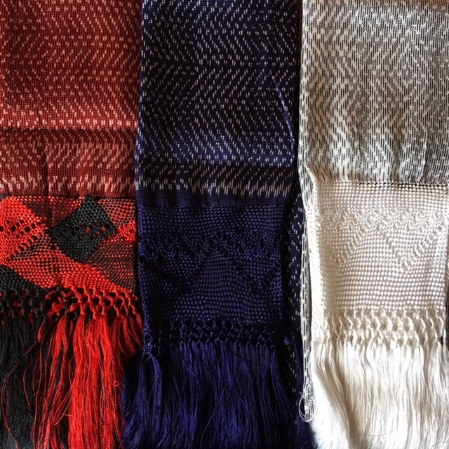 Three scarves with different patterns and colors displayed side by side Cobalt White