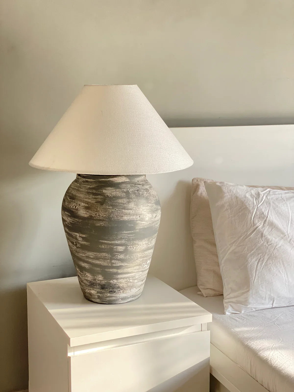 “Slate’ lamp with handcrafted terracotta base in rustic white and grey tones, paired with large neutral shade – 24.8-inch industrial ceramic lighting.”