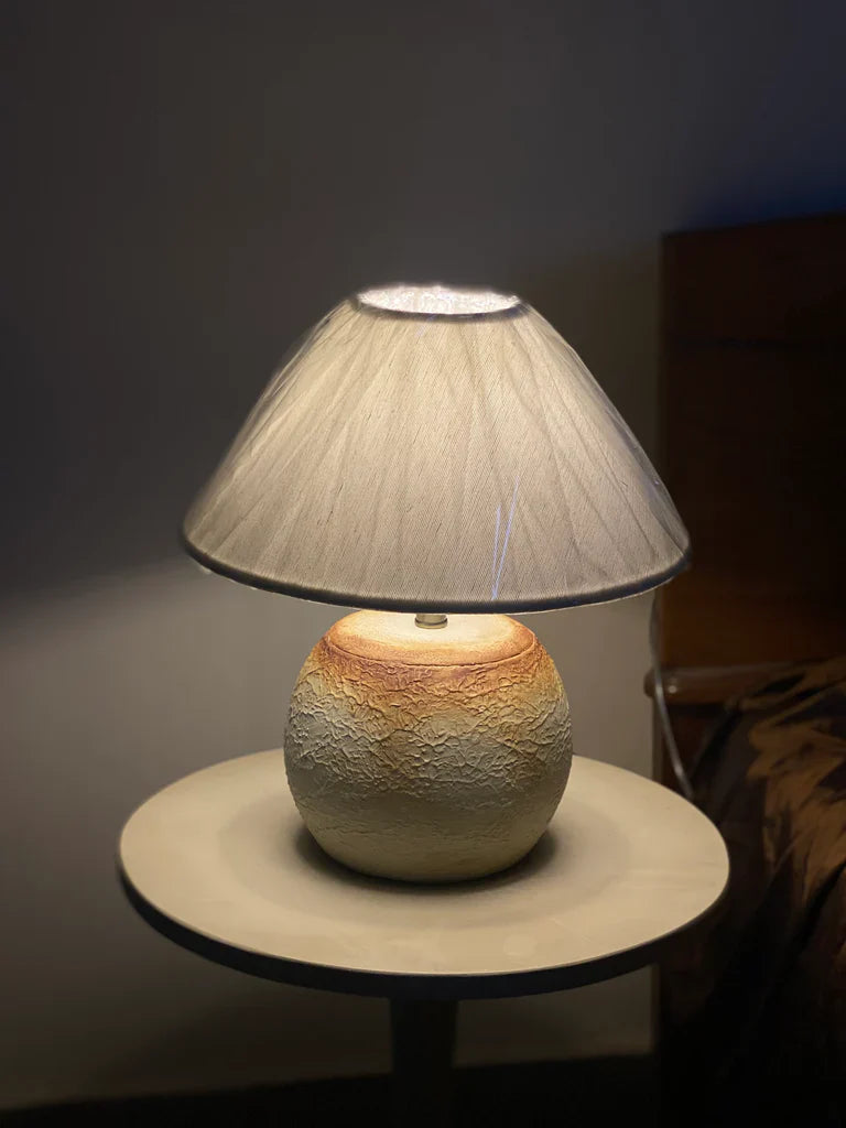 “Mini caramel popcorn textured terracotta lamp with handmade ceramic base and neutral shade – 14.5-inch artisan lighting for compact spaces.”