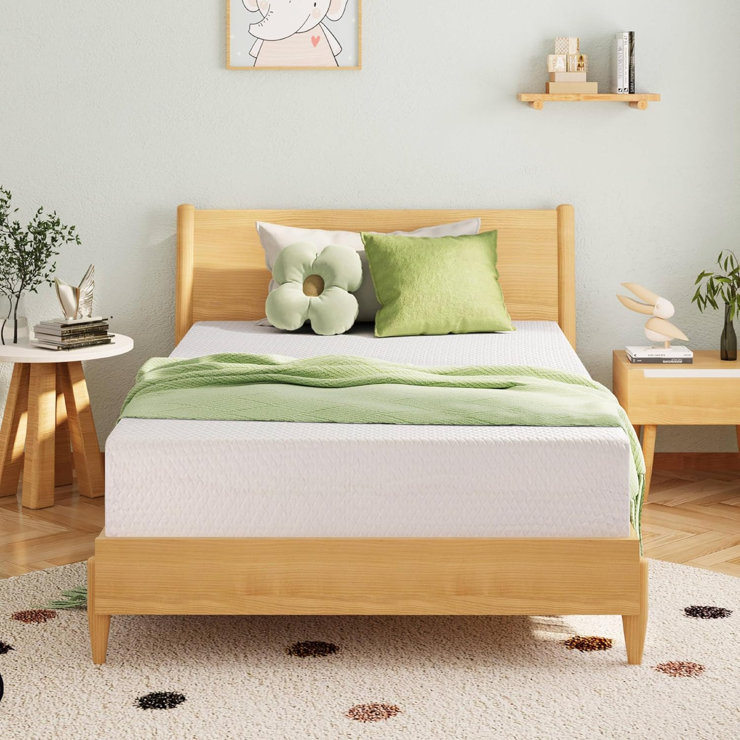 Bedroom with a wooden bed, green bedding, and decorative elements.
