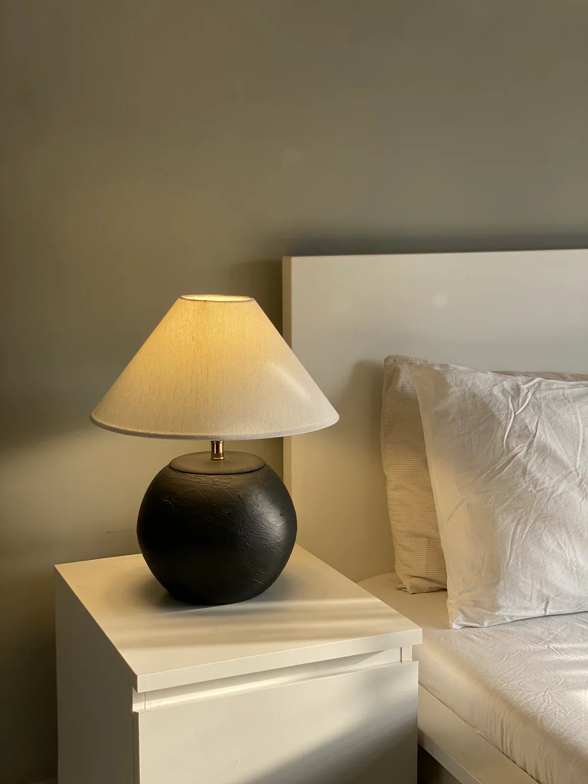 “Orb’ lamp with matte-finished terracotta base and gold accents, paired with a soft cream shade – 17.2-inch artisan lighting for modern spaces.”