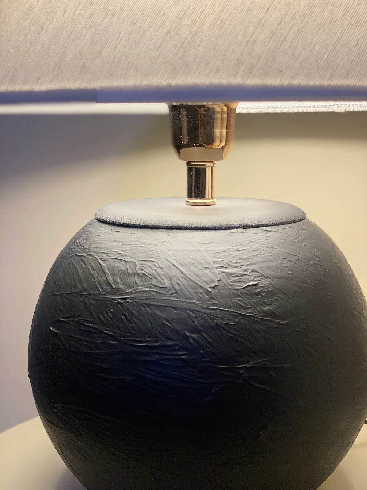 “Orb’ lamp with matte-finished terracotta base and gold accents, paired with a soft cream shade – 17.2-inch artisan lighting for modern spaces.”