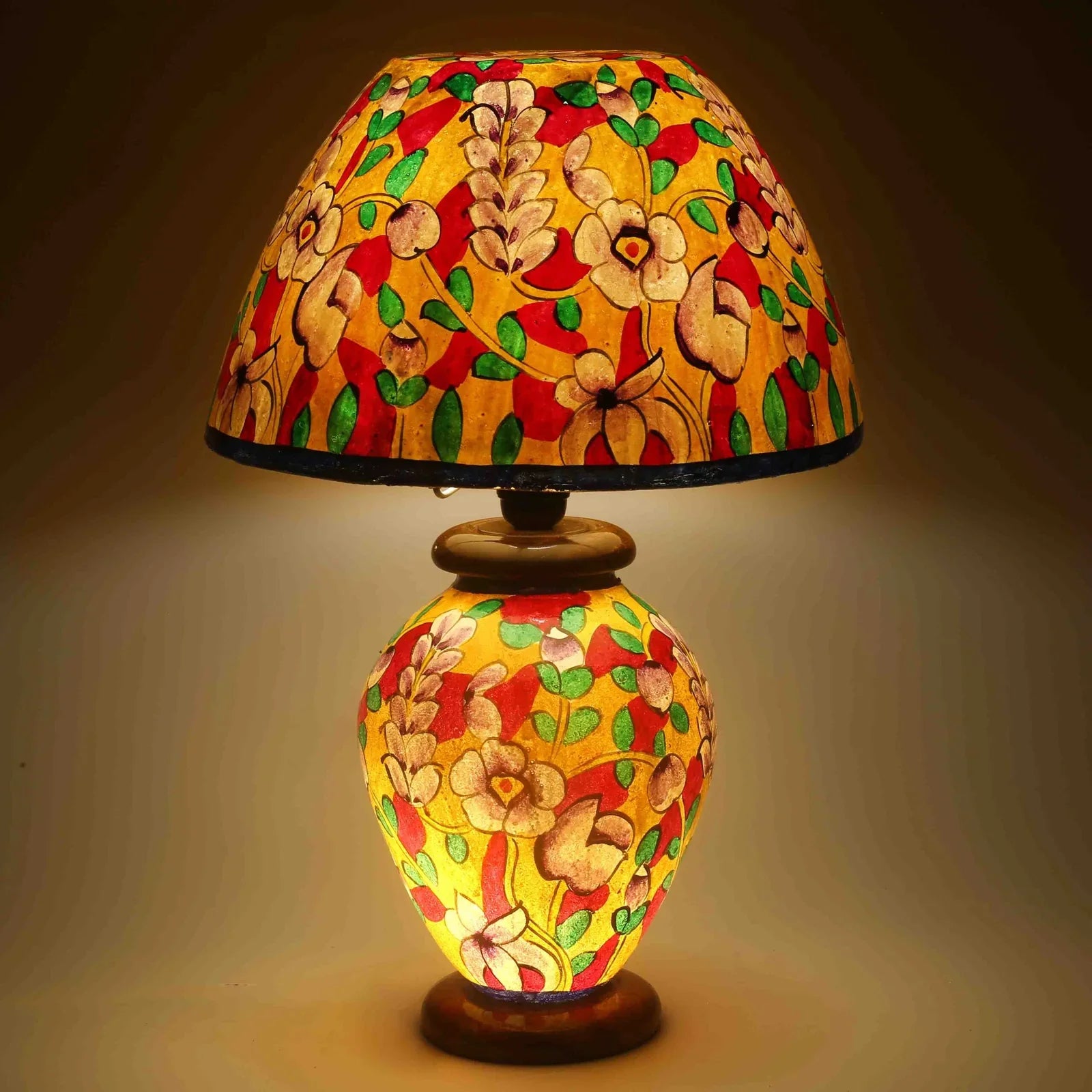 “Yellow floral camel skin lamp – handpainted artisan lamp with wooden base and warm glow”