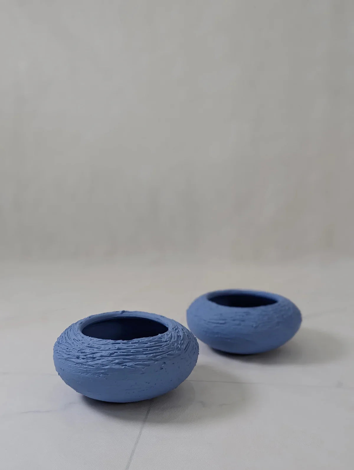Handmade Den Soft Blue Ceramic Vase, 4" tall, 9" wide, nest-like design for home decor