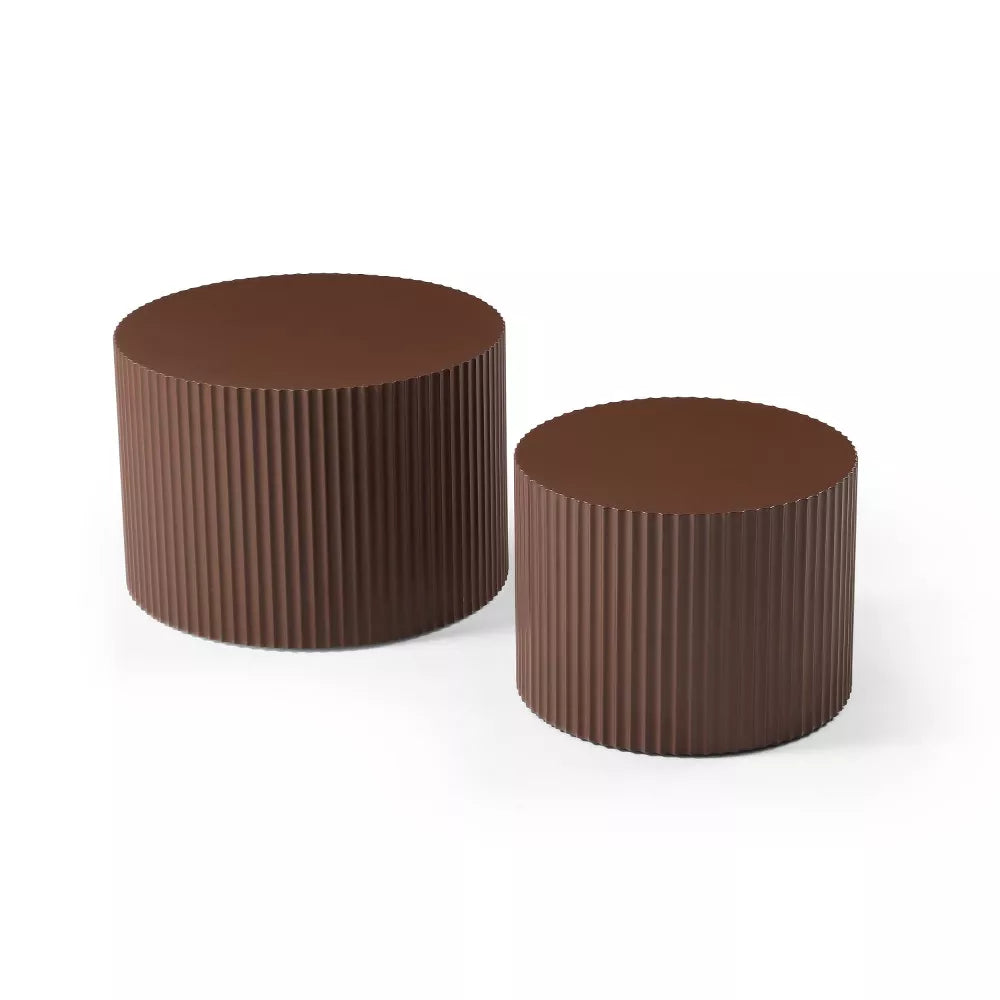 Two brown ribbed cylindrical objects on a white background brown