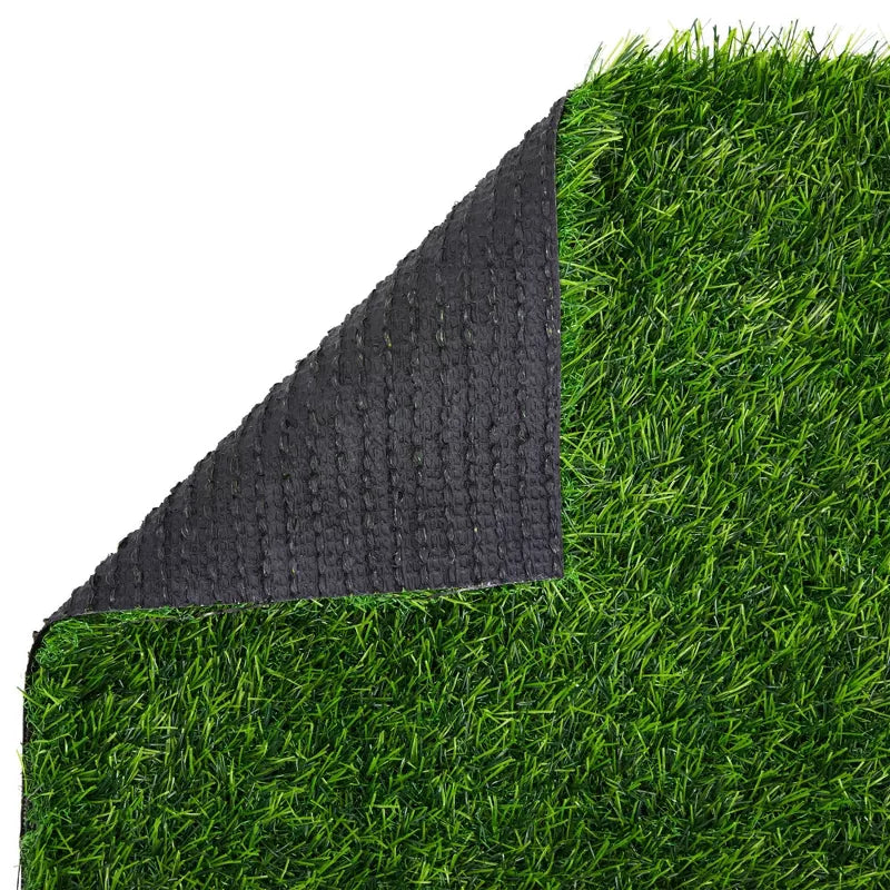 Close-up of artificial grass with a textured black backing