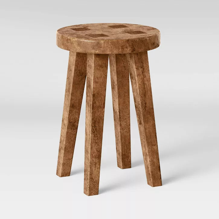 Short Wooden stool with a checkered pattern on a white background