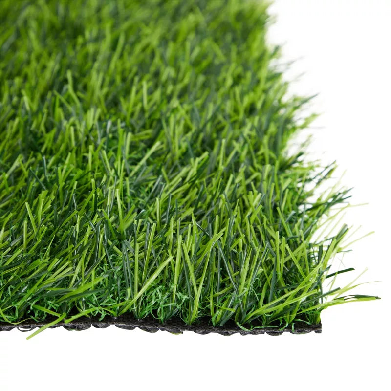 Close-up of artificial grass with a white background