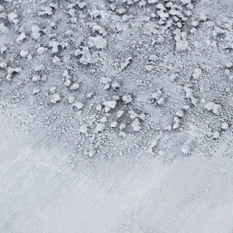 Close-up of small stones on a textured surface