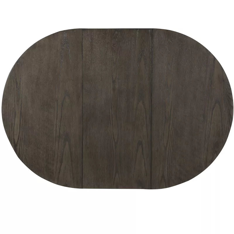 Dark brown oval placemat on a white background