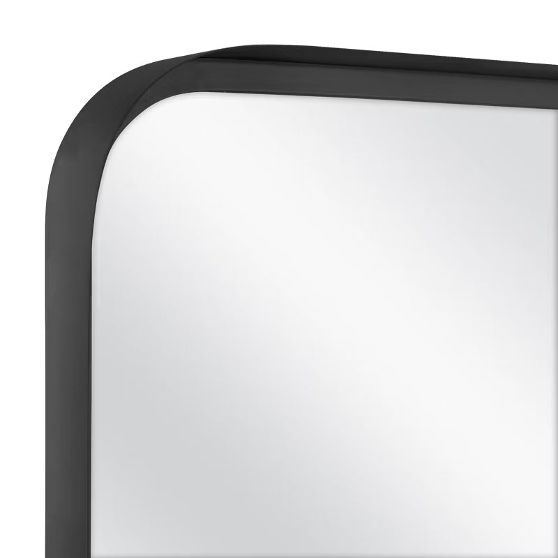 Rectangular mirror with a black frame on a white background Brass