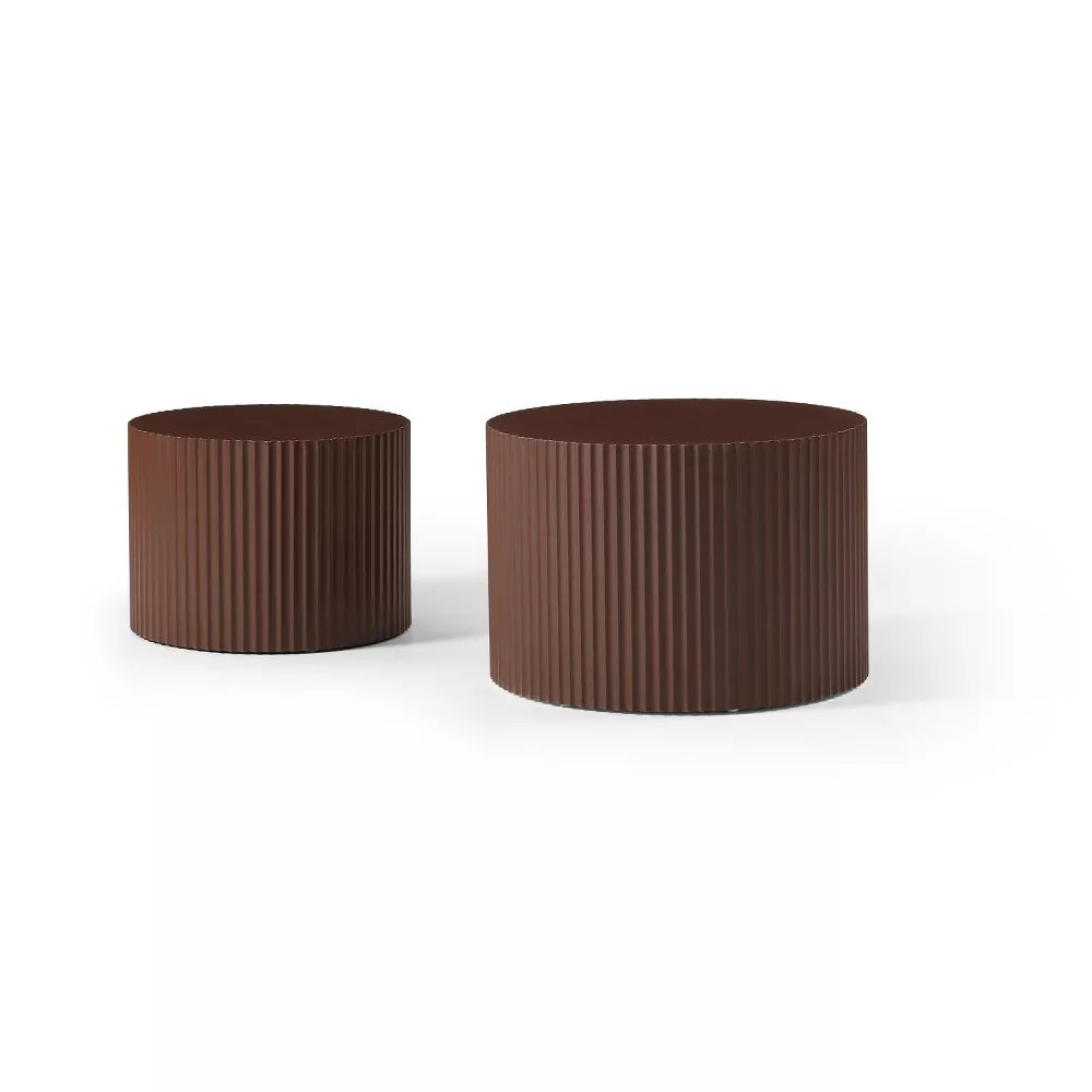Two brown ribbed cylindrical objects on a white background brown