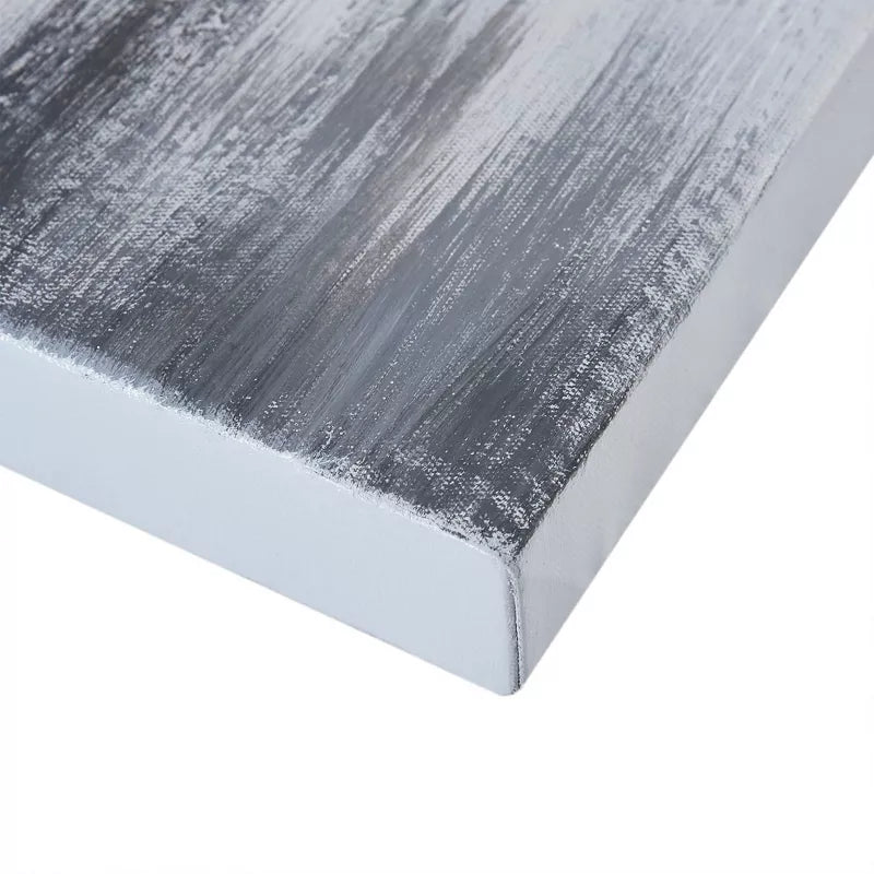 Close-up of a textured gray surface with a white border