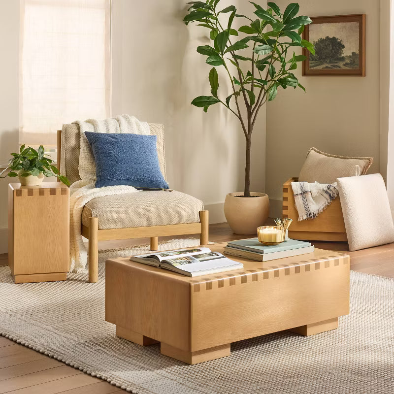 Blue textured pillow on a light gray background Navy